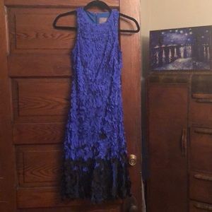 Peteled and headed cocktail dress